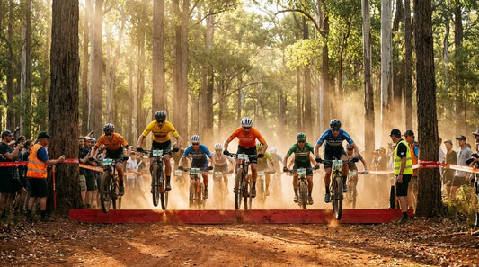 BMX racers launching off the start ramp at the UCI World Championships.